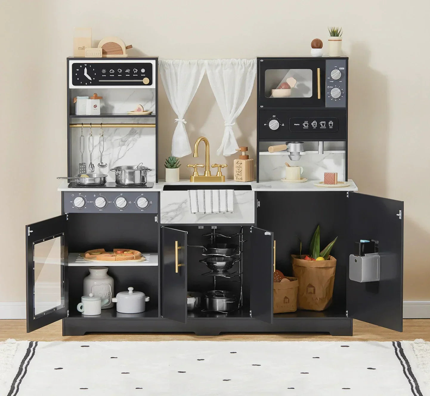 a well decorated kids play kitchen full of play kitchen accessories in the room