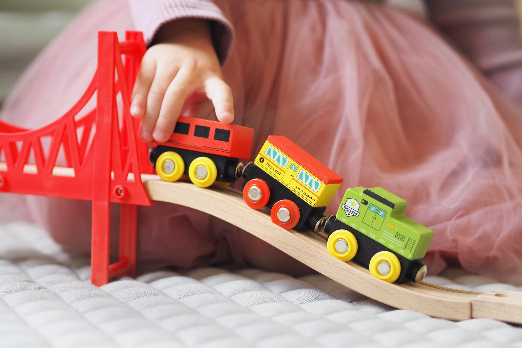 Who makes thomas the train wooden toys: A Timeless Treasure Made by Fisher-Price - Tiny Land INC