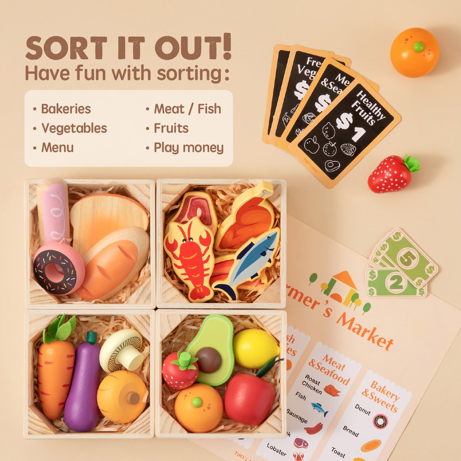 A flat lay features the Tiny Land Play Food – Play Kitchen Accessories set, including wooden bread, veggies, fish, play money, and cards for sorting—next to a "SORT IT OUT!" sign for fun bakery and market pretend play.
