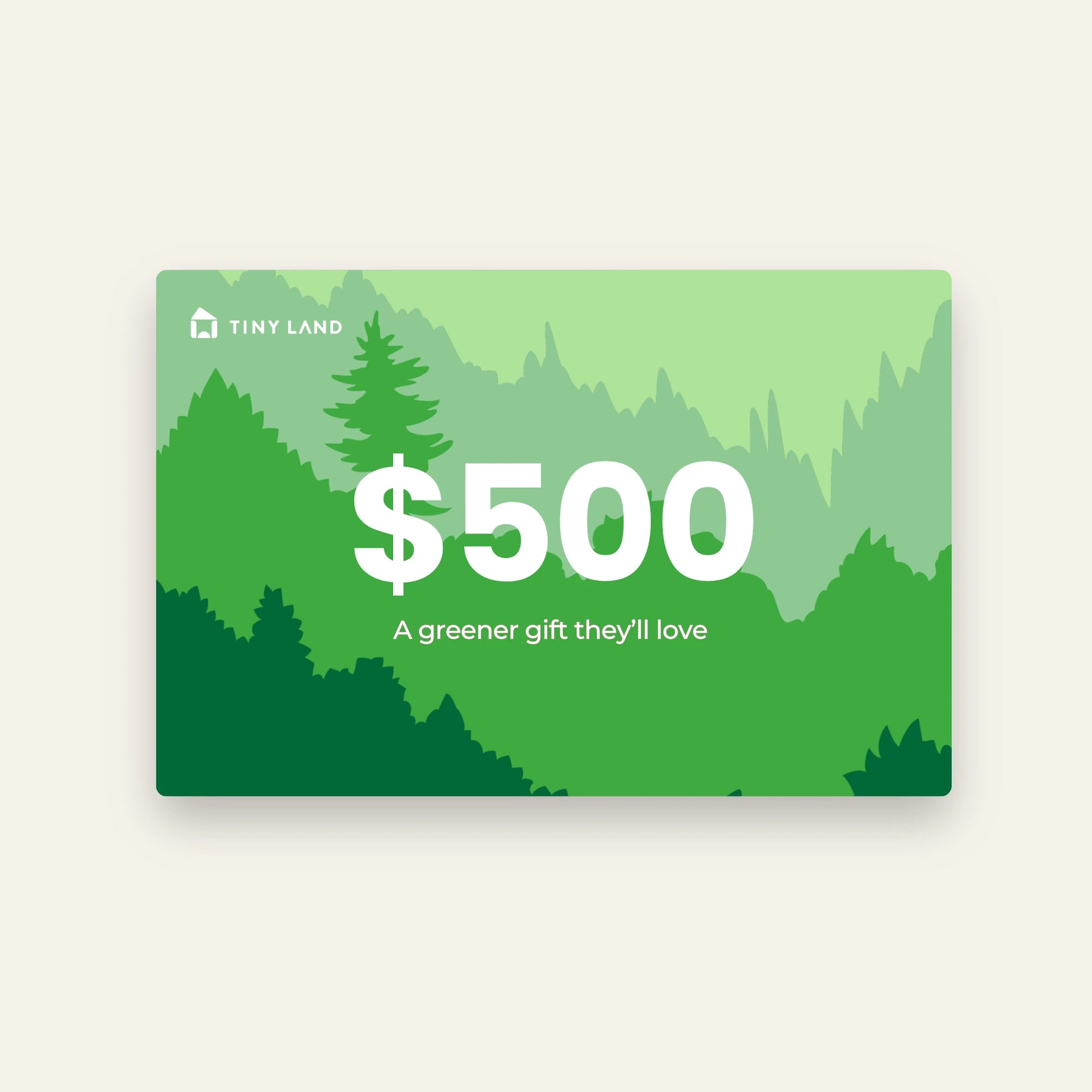A $500 Tiny Land® Gift Card from Tiny Land, featuring layered green trees and mountain illustrations with "A greener gift they'll love" in white—an ideal online gift card for any occasion.