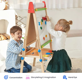 Two children play with the Tiny Land® 3-in-1 Art Easel for Kids, using its magnetic and drawing tools. The girl stands by the Tiny Land magnetic whiteboard chalkboard, arranging shapes, while the boy sits nearby and smiles. Sunlight streams through a window beside them.|red