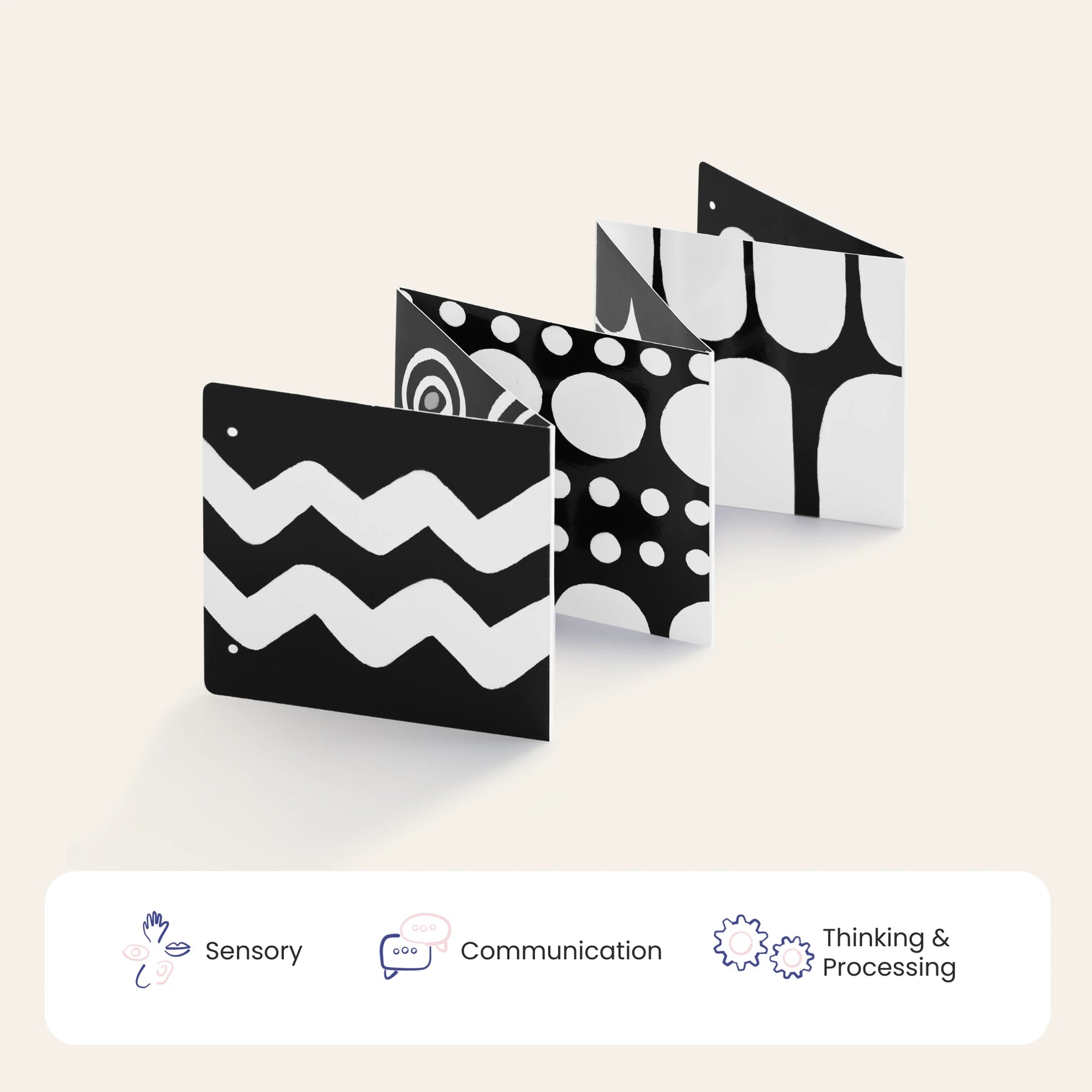 The Tiny Land® Montessori Toys for Newborns (0–3 Months) feature a black and white fold-out board with high-contrast patterns—perfect for sensory play during tummy time. Icons below highlight Sensory, Communication, and Thinking & Processing benefits.