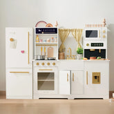 The Tiny Land All-in-One Family Feast Gift Set features a luxury kitchen and fridge with organic food, including a stove, oven, sink, microwave, cupboards, and accessories—perfect for kids who love imaginative cooking play.