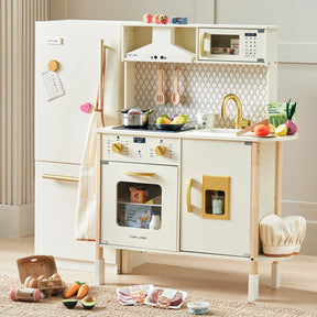 The Tiny Land® Farm-to-Table Play Set includes an interactive kitchen, storage fridge, and organic food collection. Kids can enjoy pretend play with fruits, vegetables, and grocery items from Tiny Land scattered in their own mini kitchen.