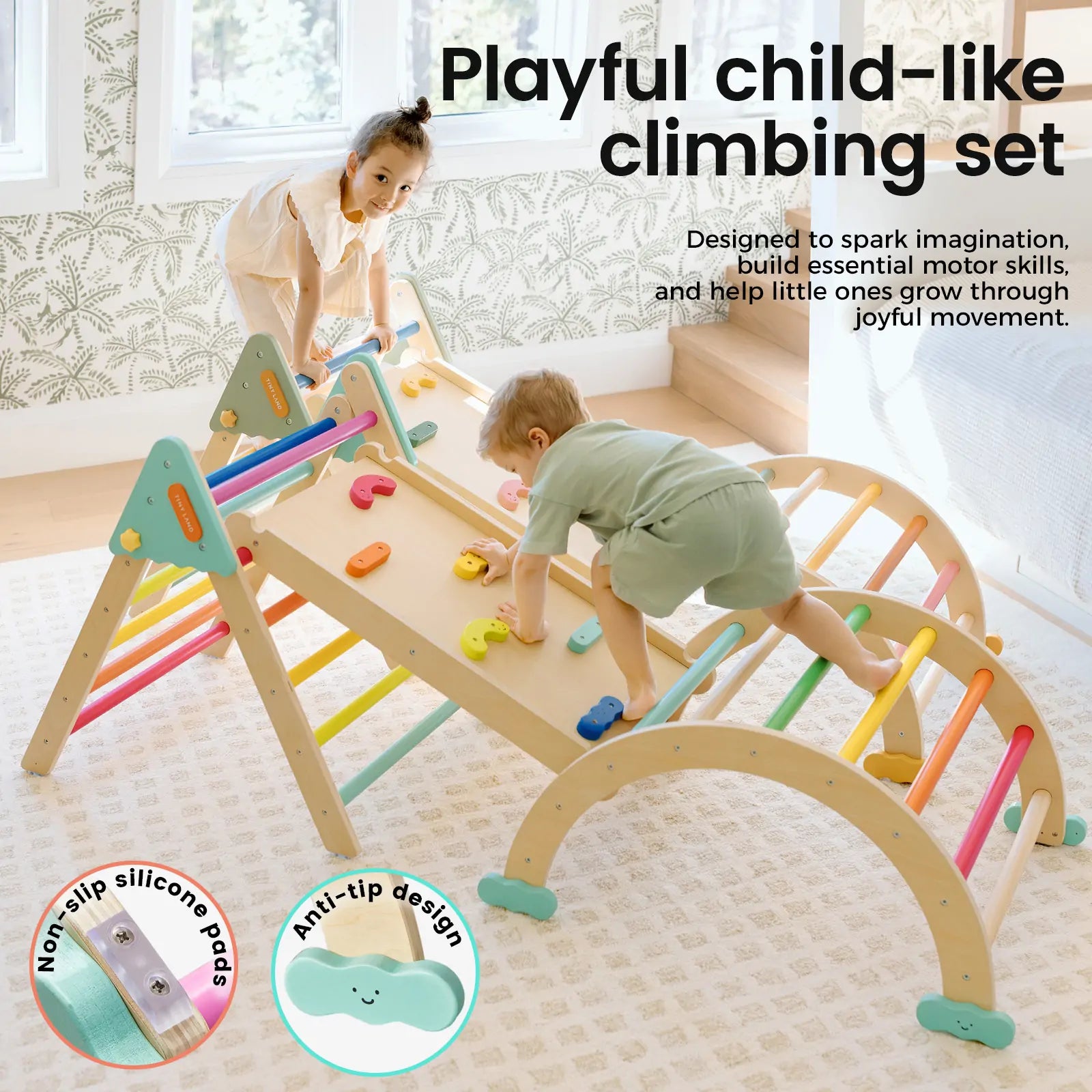 Two young children play indoors on the Tiny Land® 7-in-1 Rainbow Pikler Triangle Set by Tiny Land. This colorful set includes arches, ladders, and a reversible ramp, plus non-slip silicone pads and an anti-tip design in a sunlit, cozy room.|rainbow color