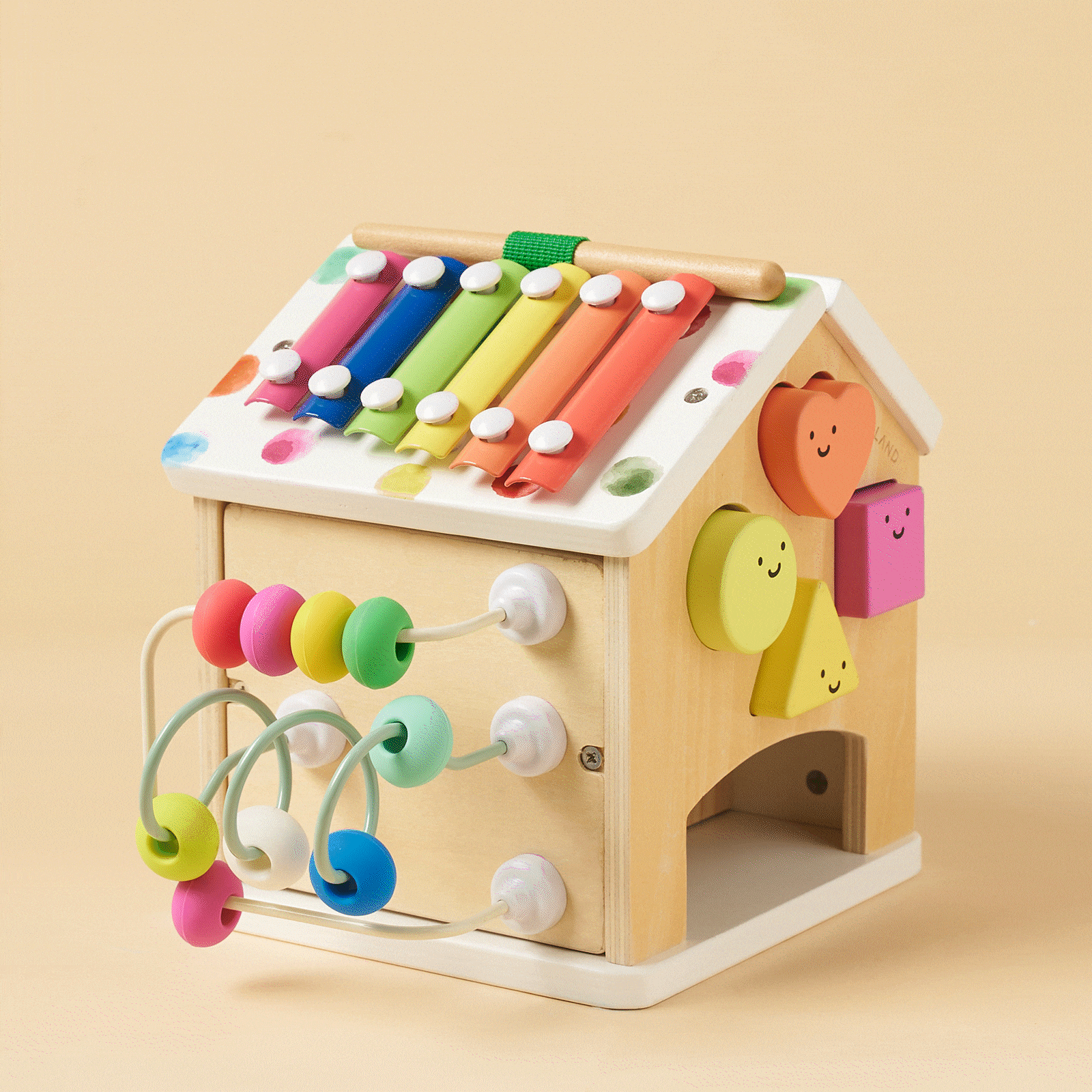 The Tiny Land Rainbow Baby Walker & Activity Cube Developmental Playset features colorful elements that encourage learning and help develop fine motor skills in young children.