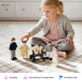 A young child sits on a carpet, playing with Tiny Land® Wooden Dollhouse Dolls—a set of poseable wooden figures crafted in classic 1:12 scale, designed by Tiny Land to inspire empathy, storytelling & imagination, and support fine motor skills. Icons below highlight these developmental benefits.