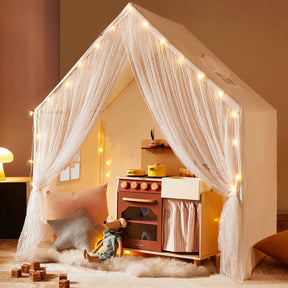 The Tiny Land® Large Space Play House with Star Lights by Tiny Land is a cozy kids’ playhouse featuring string lights, sheer curtains, a toy kitchen, plush cushions, soft rug, wooden blocks, and a stuffed mouse for inviting play.|mesh