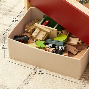 The Tiny Land® 1920 Railway Adventure Train Table by Target includes cars and tracks inspired by a 1920s city, in an open box measuring 9.8" (25 cm) wide, 5.1" (13 cm) high, and 14.2" (36 cm) long.