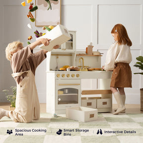 Two children play with the Tiny Land® Wooden Play Kitchen with Storage for Creative Toddlers—one pours pretend food from a bin while the other stands nearby. Icons showcase features such as a spacious cooking area, smart storage bins, included pretend cookware, and interactive design details by Tiny Land.|cream