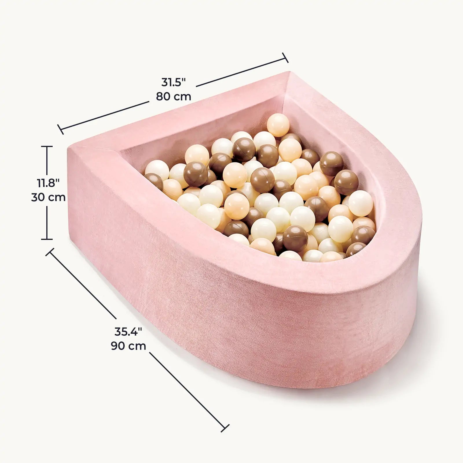 The Tiny Land® Violet PlayNest Climbing Ball Pit Set with Tunnel features a pink, velvet-textured, U-shaped foam design filled with beige, brown, and cream balls, adding a touch of elegance to any indoor playground. The dimensions—31.5 x 35.4 x 11.8 inches (80 x 90 x 30 cm)—are displayed next to the pit.|Pink