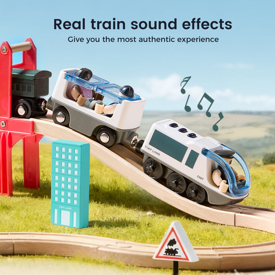 The Tiny Land® Dual-Color Electric Toy Train features clear roofs, mini figures, and LED headlights. It runs on a wooden track with real train sounds, musical notes, a blue block, and red bridge for interactive outdoor play.|White