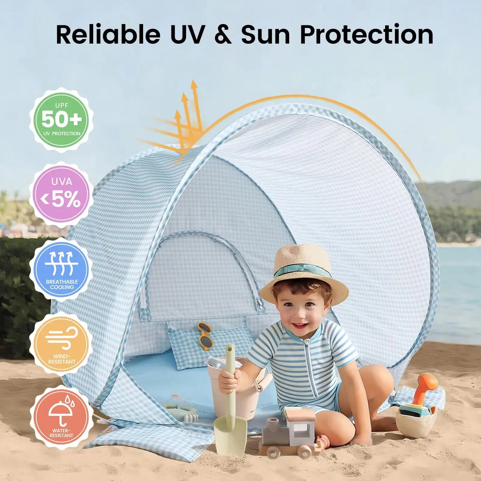 A small child in a striped outfit sits in the Tiny Land® One-Stop Beach Toy & Tent Set, enjoying playtime. Icons highlight UPF 50+ UV protection, UVA <5%, breathability, and water resistance by Tiny Land.|Light Blue Gingham