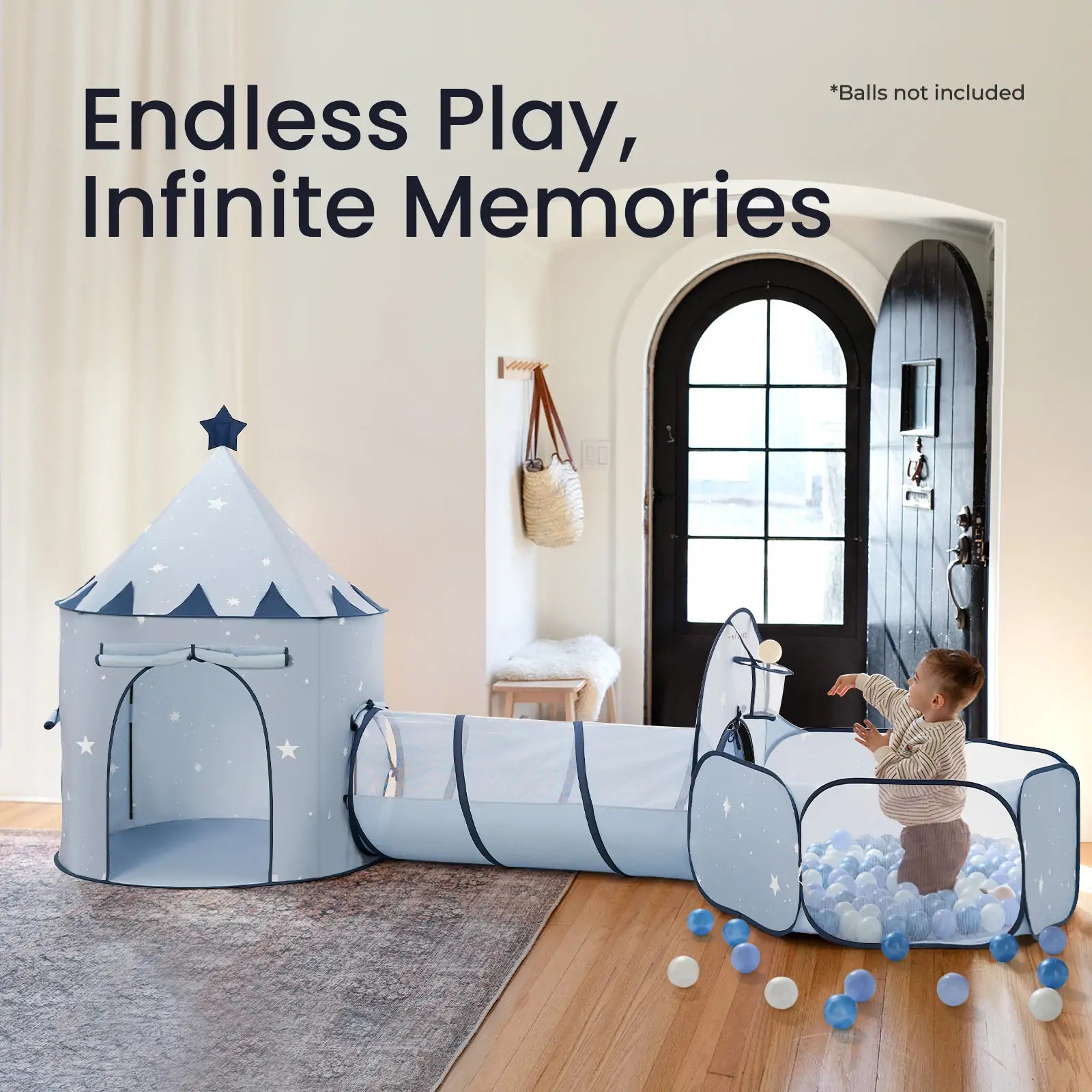 A young child plays in the Tiny Land® Adventure 3-in-1 Play Tunnel & Ocean Ball Set - Blue, featuring a castle, tunnel, and ball pit with blue and white balls. Text: Endless Play, Infinite Memories. Brand: Tiny Land.|blue