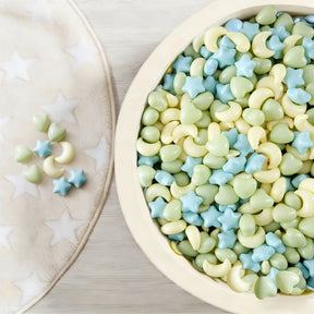 The Tiny Land® Green Adventure 3-in-1 Play Tunnel & Fun-Shapes Ocean Ball Set by Tiny Land features ocean balls shaped like stars, hearts, and crescent moons in blue, green, and yellow—perfect for sensory play and little hands to explore.