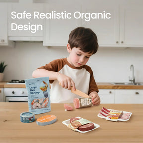 A young boy in a kitchen plays with Tiny Land Play Food’s Organic Meat & Seafood Pack, featuring realistic pretend shrimp, sausage, salmon, steak, bacon, and canned fish. Safe Realistic Organic Design is shown above him.