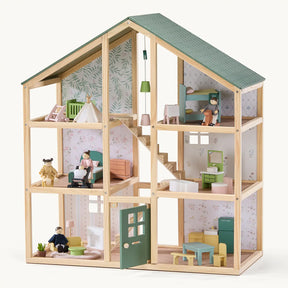 The Tiny Land® Sweetwood Evergreen Dollhouse features a green roof, six furnished rooms with patterned wallpaper, playful details, and comes with Wooden Dollhouse Dolls ready to explore charming miniature furniture on every floor.