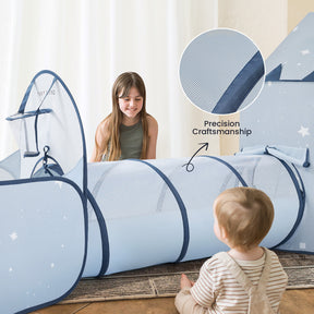 A young girl smiles at a toddler as they play near the Tiny Land® Adventure 3-in-1 Play Tunnel & Ocean Ball Set - Blue. An inset shows its starry mesh and Precision Craftsmanship—ideal for any Tiny Land play tent or ball pit setup.|blue
