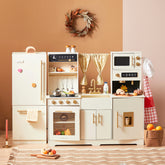 Introducing the Tiny Land All-in-One Family Feast Gift Set: Luxury Kitchen & Fridge & Organic Food Collection—a beautifully crafted children’s wooden play kitchen in elegant cream and wood tones. This deluxe set features a fridge, oven, sink, stove, and microwave, complete with toy organic food and utensils for immersive pretend play. Charming touches like a decorative wreath and gold curtains above the kitchen add to the imaginative experience, making it perfect for inspiring little chefs.