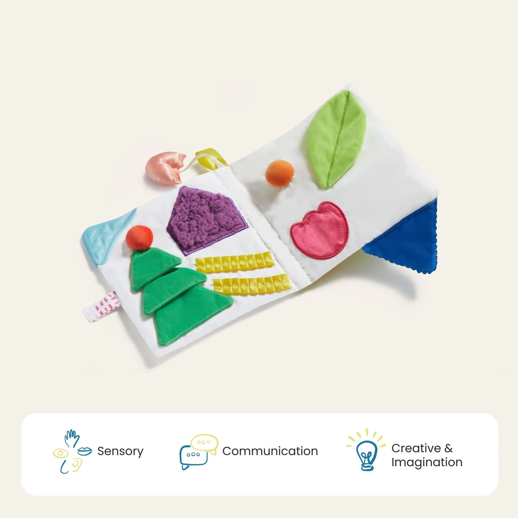 The Brain & Hands Playset — Montessori Box (4–6 Months) + Activity Cube by Tiny Land features sensory cloth books with textured shapes like trees and apples, fostering exploration, communication, and imagination in babies.