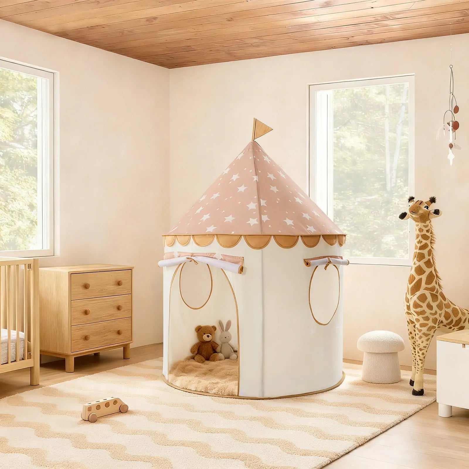 A cozy, neutral-toned nursery with a Tiny Land® Kids Tent – Indoor Tent for Toddlers, a large giraffe plush, crib, dresser, soft rug, wooden toys, and two windows letting in natural light.|Brown