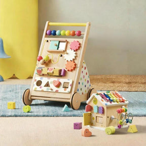 The Tiny Land Rainbow Baby Walker & Activity Cube Developmental Playset, with vibrant wood, interactive beads, gears, and a xylophone, is perfect for fine motor skills and sensory development.