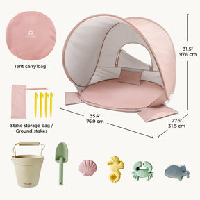 The Tiny Land® One-Stop Beach Toy & Tent Set – Blush Pink includes a UV-protective tent, carry bag, four yellow stakes with storage bag, beige bucket, green shovel, and five sea-themed sand molds—displayed with measurements.|Blush Pink