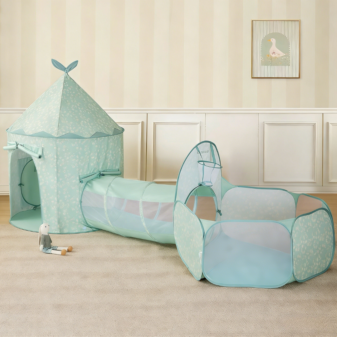 The Tiny Land® Compact Adventure 3-in-1 Play Tunnel With no Balls - Green by Tiny Land sits on a beige carpet near a stuffed bunny. The room has striped wallpaper, white wainscoting, and a framed bird picture on the wall.|green