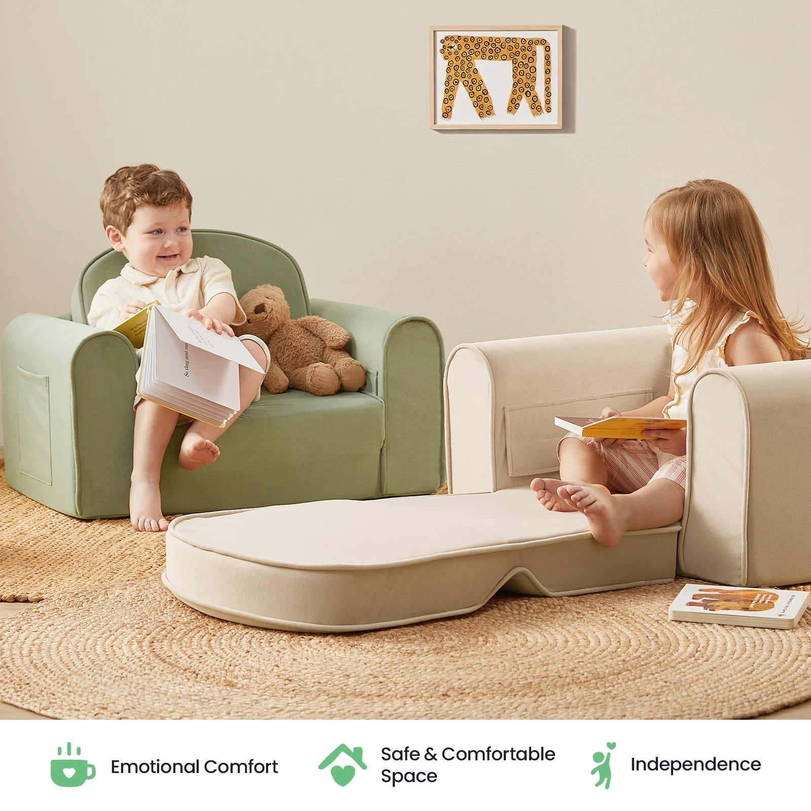 Two young children sit on Tiny Land® GentleSnug Kid Chairs, facing each other with books in a cozy, neutral-toned room. A plush bear and a small canvas featuring a giraffe drawing are visible. The foldable GentleSnug Kid Chair by Tiny Land is crafted from high-density foam, providing comfort and support, while icons below highlight its comfort, safety, and ability to encourage independence.|Beige