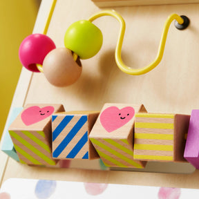 The Tiny Land Rainbow Baby Walker & Activity Cube Developmental Playset features a bead maze and spinning blocks in pink, green, and natural wood—ideal for fine motor skills and pairs perfectly with any Montessori or wooden baby walker setup|Rainbow