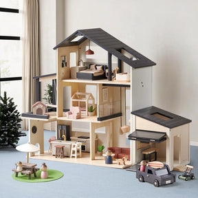 The Tiny Land® Wooden Dollhouse - Garage by Tiny Land features three modern floors, miniature furniture, accessories, a garage for toy cars, and an outdoor play area, set on a light blue floor near a small Christmas tree.