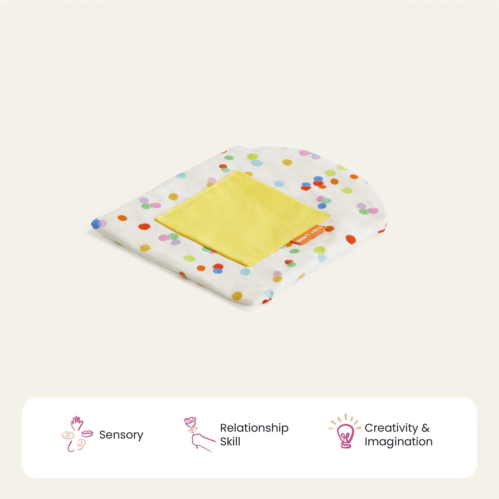 The Tiny Land® Montessori Toys for Infants (10–12 Months) sensory pouch features colorful polka dots and a yellow square patch, supporting sensory, relationship, and creativity skills—ideal for any Montessori playset collection.
