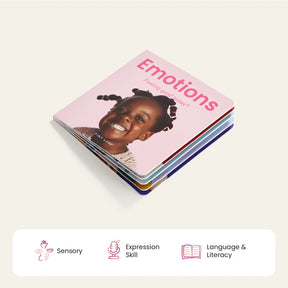 A children’s board book titled Emotions with a smiling girl on the cover sits above icons labeled Sensory, Expression Skill, and Language & Literacy—great for pairing with Tiny Land® Montessori Toys for Infants (10–12 Months) by Tiny Land.