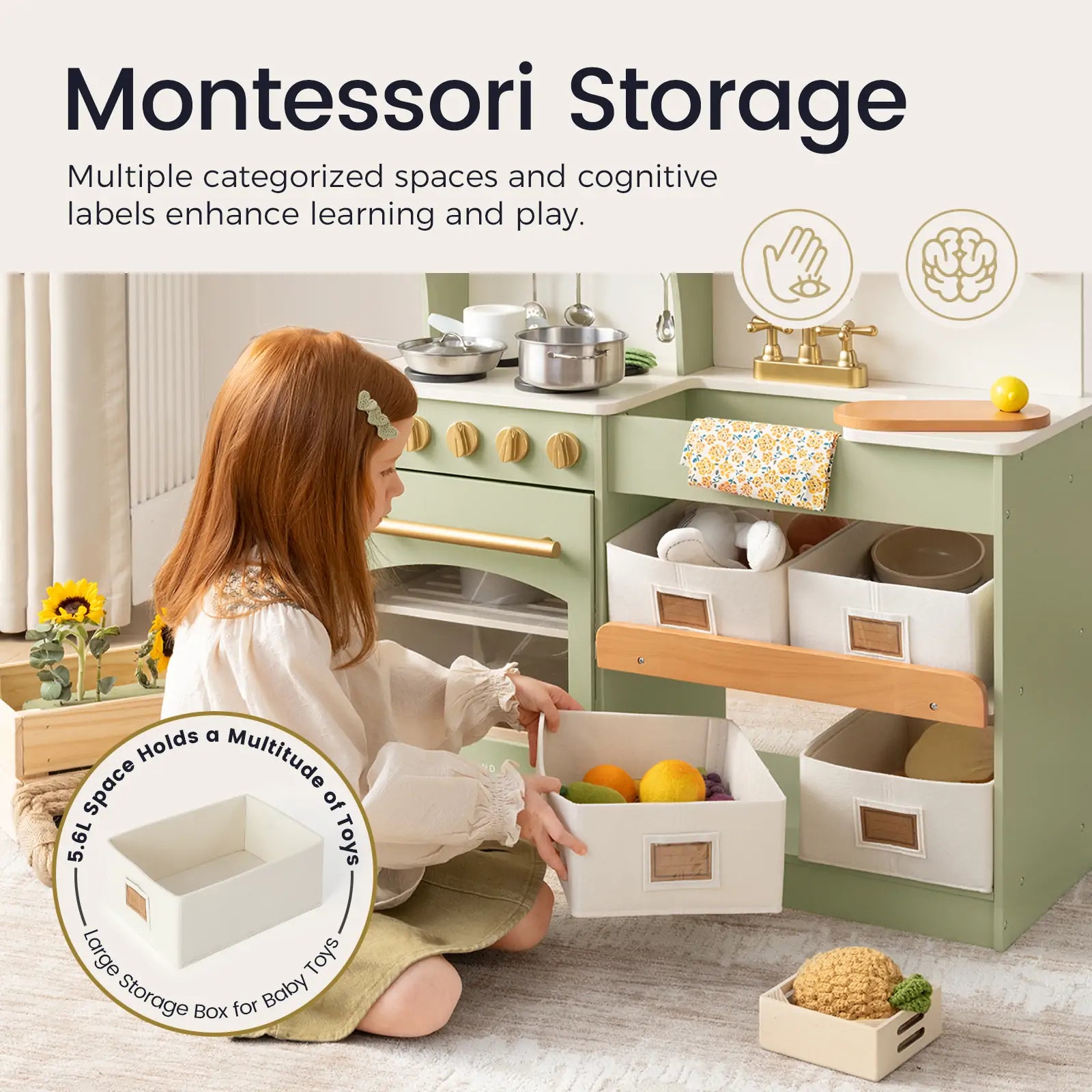 A child sits on the floor, engaging with the Tiny Land® Wooden Play Kitchen with Storage for Creative Toddlers by Tiny Land. The organized and vibrant space features labeled bins, toy fruits, and kitchen items, along with pretend cookware that encourages learning and imaginative play.|sage
