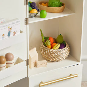 The Tiny Land® PopJoy Kitchen & Fridge Set by Tiny Land features toy foods like a basket of felt fruits and veggies, a wooden milk carton, and toy eggs—ideal for pretend play.