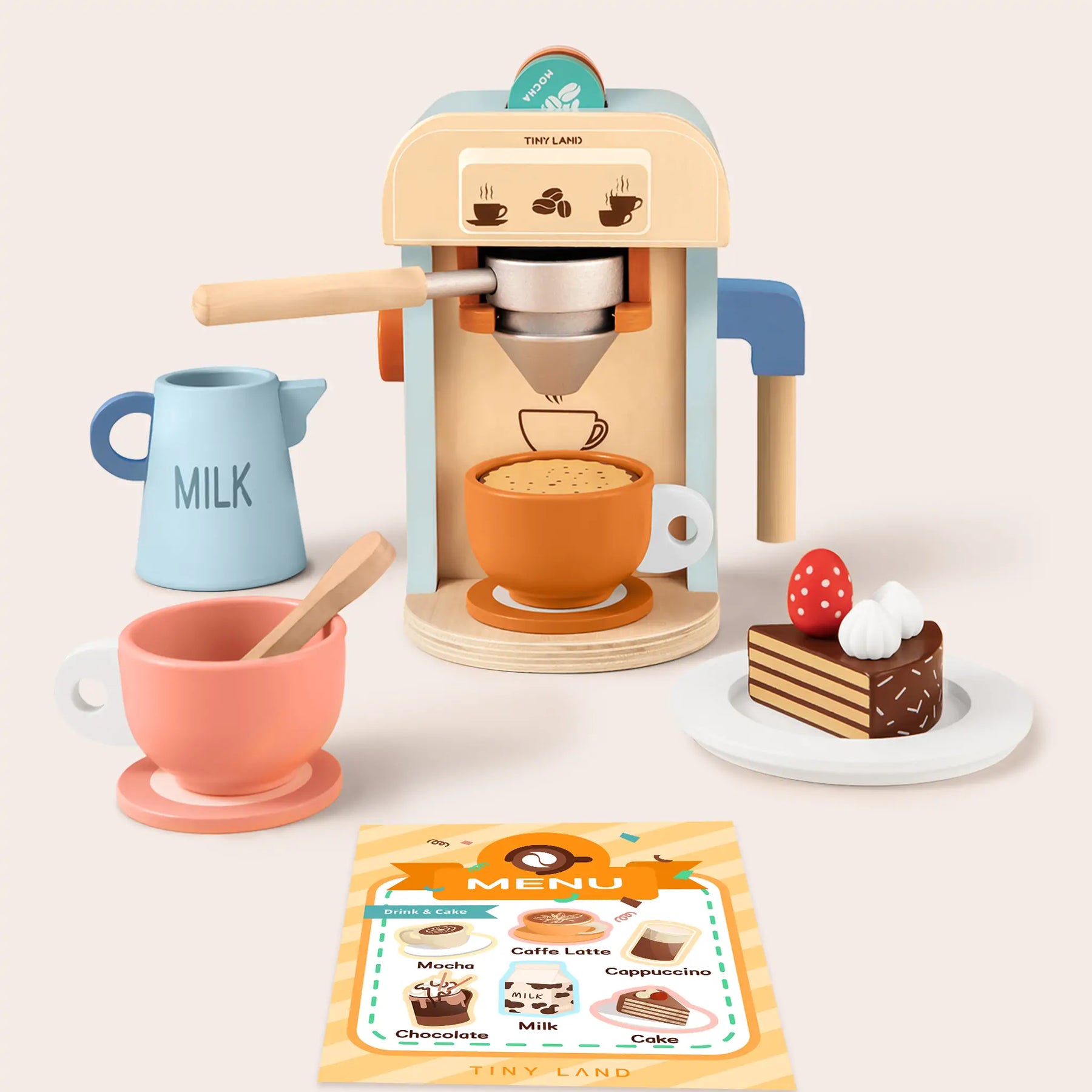 The Tiny Land® Play Kitchen Accessories – Children’s Coffee Maker Set includes a wooden coffee maker, milk jug, two cups (one with a spoon), cake slice with whipped cream and strawberry, and a menu card—perfect for kids’ kitchen play.