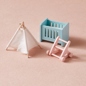 The Tiny Land Sweet Dreams Playset—Pink Dollhouse and Pink-White Playhouse—features a white tent, blue crib, and pink baby walker, perfect as wooden dollhouse furniture or for any dollhouse for girls.|pink