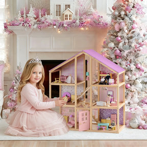 A young girl in a pink dress and tiara plays with the Tiny Land® Sweetwood Unicorn Dollhouse & Wooden Dollhouse Dolls by Tiny Land, surrounded by festive décor, a Christmas tree, and pink ornaments in a beautifully decorated room.|Unicorn