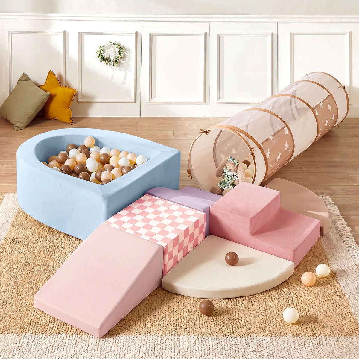 Transform your play area with the Tiny Land® Violet PlayNest Climbing Ball Pit Set with Tunnel by Tiny Land, featuring colorful foam steps, slides, a large ball pit filled with brown and white balls, a pink checkered mat, a round beige mat, a soft play tunnel, and cozy pillows on a beige rug—all in a bright indoor setting.|Blue
