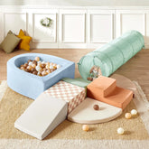 Transform your indoor playground with the Tiny Land® PlayNest Climbing Ball Pit Set with Tunnel. This soft play area features pastel foam shapes—including a slide, steps, tunnel, and a unique curved ball pit filled with beige, brown, and white balls—inviting little ones to explore under the trusted Tiny Land name. A cuddly stuffed bunny sits inside the tunnel while cozy cushions and a decorative wreath create an inviting background.|Blue