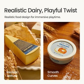 Two toy food items from the Tiny Land® Organic Dairy Pack by Tiny Land Play Food are shown: a realistic wedge of cheese with a blue label on a plate, and organic cream cheese, offering realistic play food for toddlers.