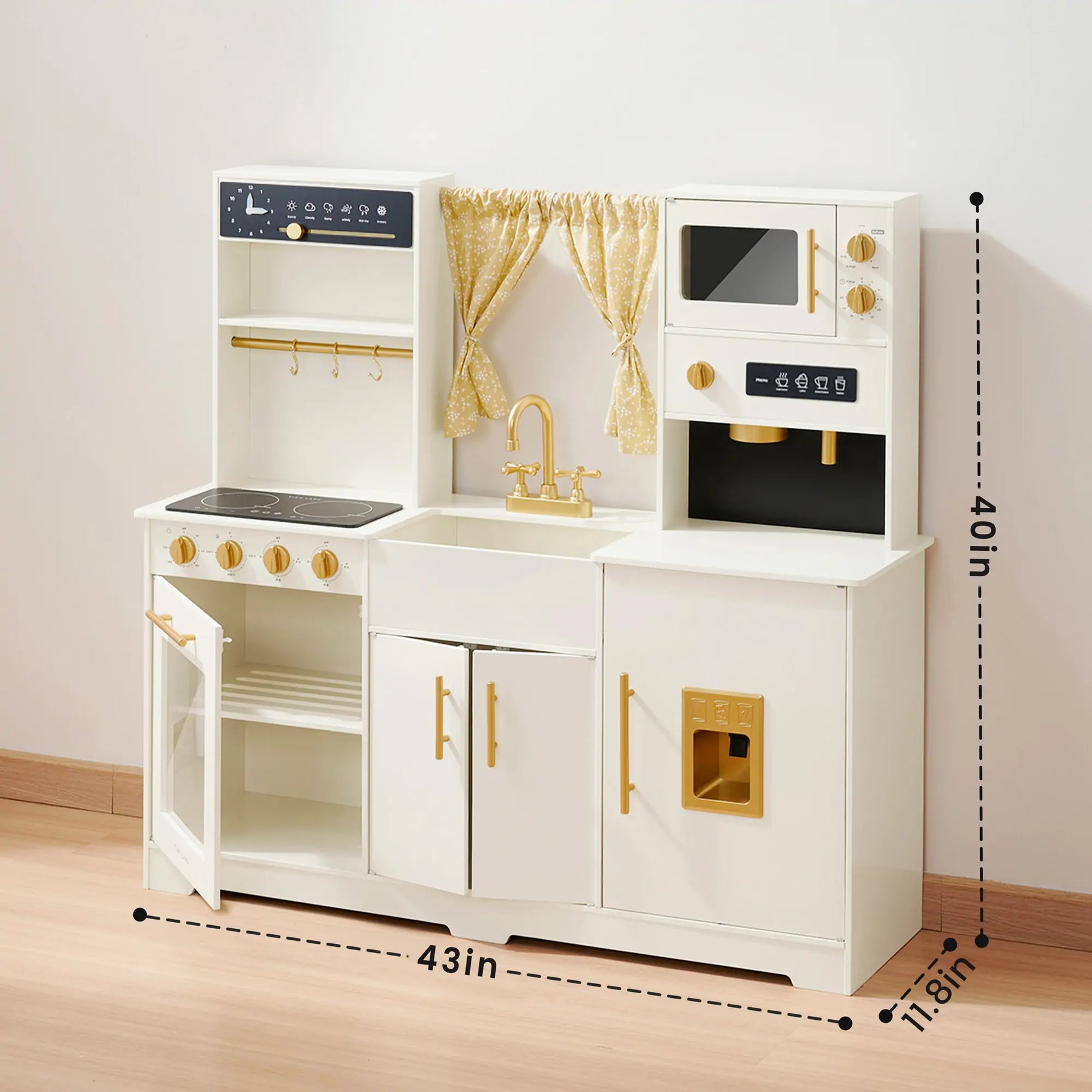 The Tiny Land® Iconic Wooden Play Kitchen – Cream is a kids kitchen set with gold handles, stove, oven with clear door, microwave, shelves, sink and curtain. Measures 43 W x 40 H x 17.8 D. Brand: Tiny Land.