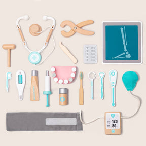 The Tiny Land® Doctor Kit for Kids by Tiny Land includes a stethoscope, x-ray tablet, pill blister pack, reflex hammer, dental tools, toothbrush, teeth model, blood pressure cuff, and more pretend play medical accessories.